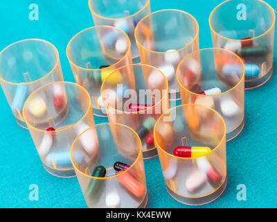 Daily medication at a hospital table, conceptual image Stock Photo