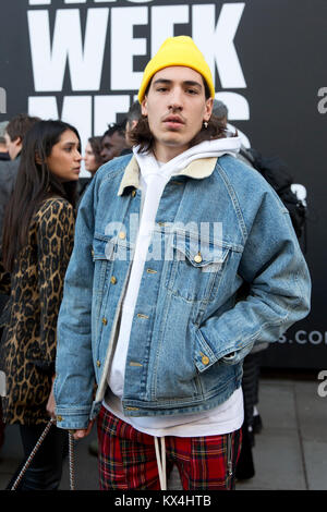 Spanish professional footballer Hector Bellerin wears Christopher Shannon  jacket and Zimmermann pyjamas during the Autumn/ Winter 2018 London Fashion  Week outside the BFC Show Space, London Stock Photo - Alamy