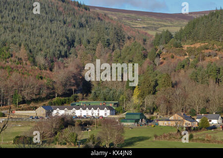 A view of the Glenmalure Inn nestled into the Wicklow uplands in Ireland Stock Photo