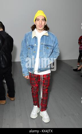 Spanish professional footballer Hector Bellerin wears Christopher Shannon  jacket and Zimmermann pyjamas during the Autumn/ Winter 2018 London Fashion  Week outside the BFC Show Space, London Stock Photo - Alamy