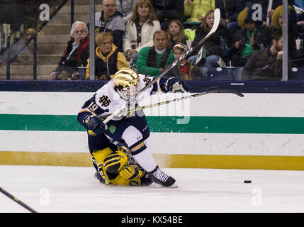 Michigan forward Tony Calderone (17) skates with the puck against ...