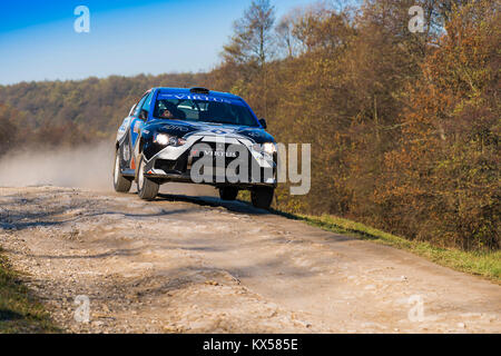 Lviv, Ukraine - November 1, 2015: Alexey Dolot's  Mitsubishi Lancer Evo X  competes at the annual Rally Galicia Stock Photo