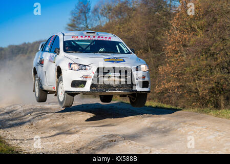 Lviv, Ukraine - November 1, 2015: Alexey Dolot's  Mitsubishi Lancer Evo X  competes at the annual Rally Galicia Stock Photo