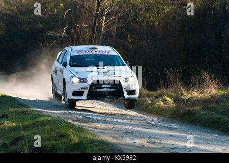 Lviv, Ukraine - November 1, 2015: Racers Alexey Dolot and Dmytro Kasap on the car brand Mitsubishi Lancer Evo X  (No.10) overcome the track at the ann Stock Photo