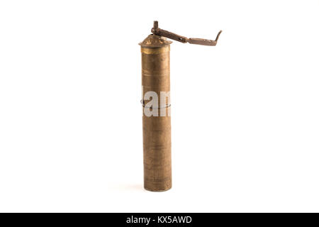 vintage brass coffee grinder over a white background Stock Photo