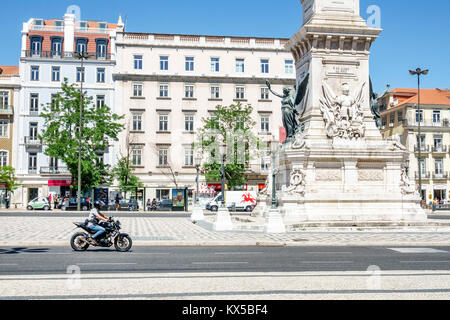 Lisbon Portugal,Baixa Pombalina,historic center,Restauradores Square,Praca dos Restauradores,public square,monument,Portuguese Restoration War,motorcy Stock Photo