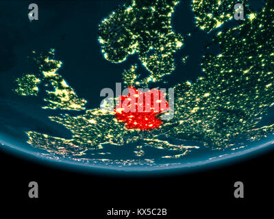 Germany at night highlighted in red on planet Earth. 3D illustration. Elements of this image furnished by NASA. Stock Photo