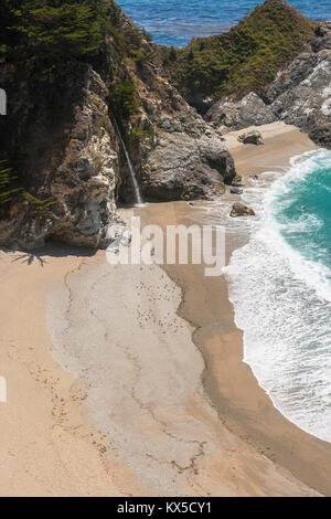 McWay Falls in McWay Creek. Beautiful pacific sand beach with waterfall along the Big Sur coast, California, USA. Stock Photo