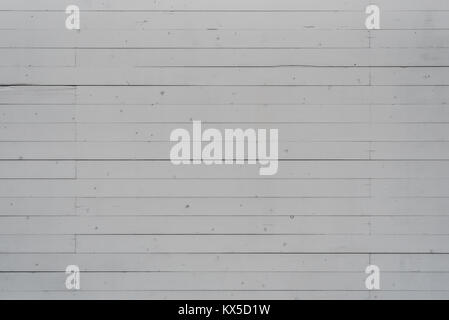 weathered white colored wooden wall  texture with nail head Stock Photo