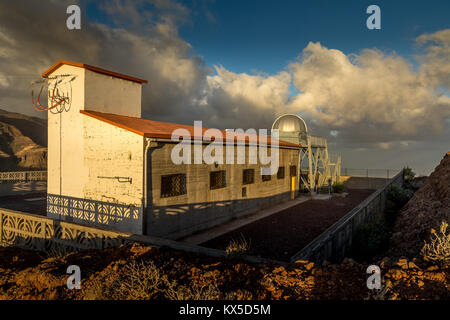 Temisas, Gran Canaria in Spain - December 13, 2017: Temisas Astronomic Observatory in Aguimes municipality. Exterior of the white building, blue sky and white clouds. Stock Photo