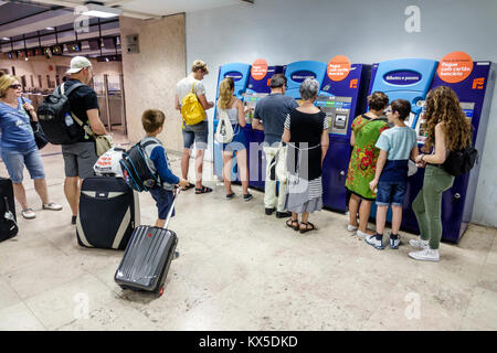 Lisbon Portugal,Santa Apolonia,Metro Lisboa,mass transit,subway,train,station,fare card,ticket,vending machine,line,queue,man men male,woman female wo Stock Photo