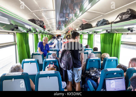 Lisbon Portugal,Santa Apolonia,Comboios de Portugal,railway,train,track,Alfa Pendular,Pendolino high-speed tilting train,inside,passenger passengers r Stock Photo