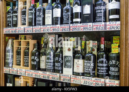 Porto Portugal,historical center,Garrafeira Cleriporto,liquor store,vintner,Port wines,display,price,Euros,bottles,Messias,Krohn,Kopke,Hispanic,immigr Stock Photo