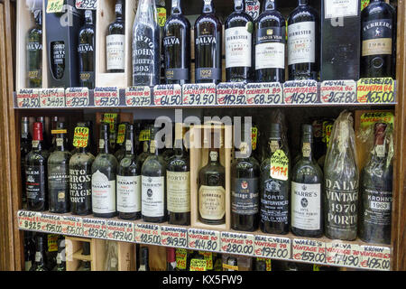 Porto Portugal,historical history center,Garrafeira Cleriporto,liquor store,vintner,Port wines,display,price,Euros,bottles,Messias,Krohn,Dalva,brand,H Stock Photo