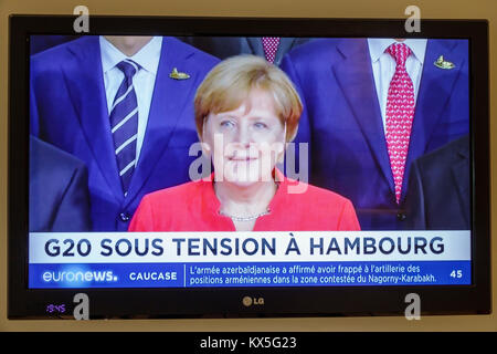 Porto Portugal,television screen tv monitor flat panel,euronews,program,headline,G20 summit,Hamburg,breaking news,Angela Merkel,leaders,Hispanic Latin Stock Photo