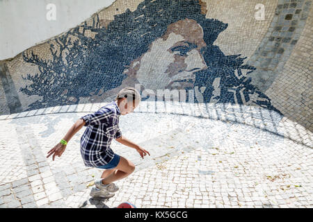 Lisbon Portugal,Alfama,historic neighborhood,Wall Of Amalia Rodrigues,tile mural,singer,fado,Black minorities,mixed race,girl girls,female kid kids ch Stock Photo