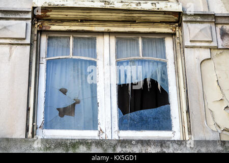 Lisbon Portugal,Marquess of Pombal,historic neighborhood,building,dilapidated,broken glass,window,Hispanic Latin Latino ethnic minority,immigrant immi Stock Photo