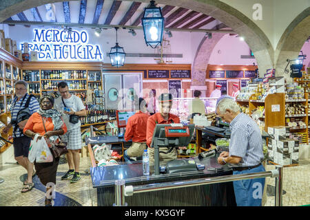 Lisbon Portugal,historic center,centre,Praca da Figueira,Mercado da Figueira,market,grocery store,cashier,Black,woman female women,shopping shopper sh Stock Photo