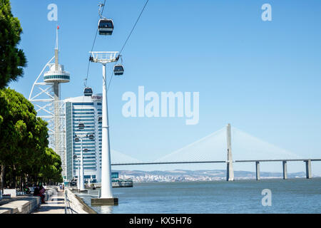 Lisbon Portugal,Tagus River,Oriente,Parque das Nacoes,Park of the Nations,Vasco da Gama Tower,waterfront,bridge,gondola lift,Hispanic,immigrant immigr Stock Photo