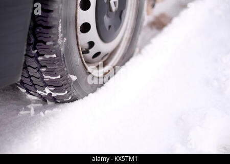 Winter Tyre  fitted to a Renault Campervan (Camper Van) in the snow Stock Photo