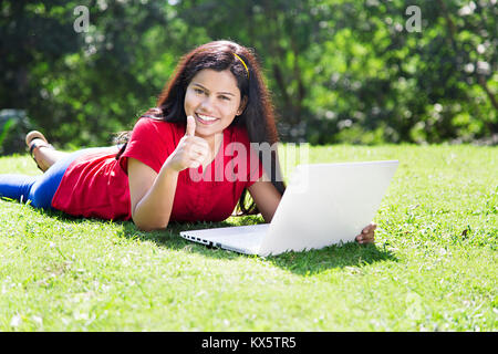 3 Indian College Students Laptop Studying Education Learning Thumbsup Park Stock Photo