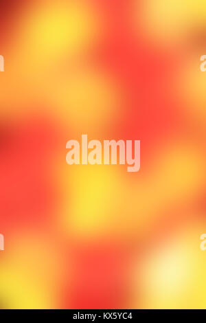 Blurred, Out Of Focus, Defocused, Bokeh Vivid Orange and Yellow Color Abstract Vertical Image for Background Stock Photo