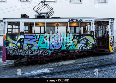 Graffiti Covered Funicular Tram (Elevador da Glória) in Lisbon, Portugal Stock Photo