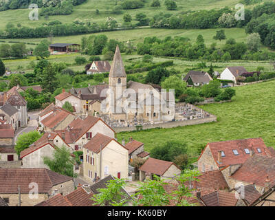 View on the town of Rochepot in Burgundy with its 12th century old Roman church and cemetery Stock Photo