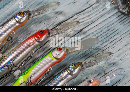 Fishing tackle - fishing rod fishing float and lures on beautiful