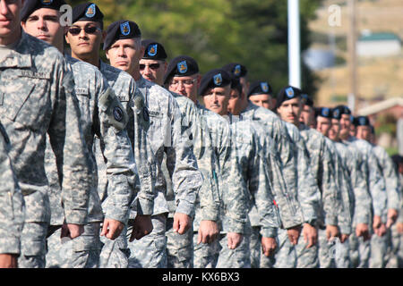 Camp Williams, UT --  On Sep. 17, 2011, Guardsmen gathered on the parade field to pay tribute to the governor of Utah.  The ceremony displays the guard families readiness through the discipline of drill and ceremony and mass numbers. Stock Photo