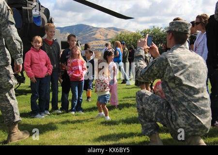 Camp Williams, UT --  On Sep. 17, 2011, Guardsmen gathered on the parade field to pay tribute to the governor of Utah.  The ceremony displays the guard families readiness through the discipline of drill and ceremony and mass numbers. Stock Photo