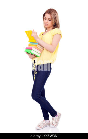 attractive girl with books in hands, isolated on white background Stock Photo