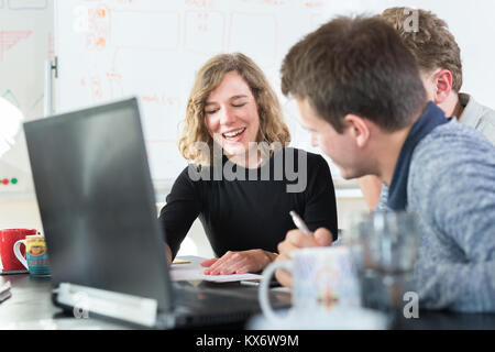 Relaxed informal IT business startup company team meeting. Stock Photo