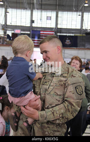 Photos by Ileen Kennedy, Z-KC166. . Soldiers of the Utah Guard’s 624th Engineers Return from Afghanistan. . The approximately 140 soldiers of the Utah National Guard’s 624th Engineer Company, 1457th Engineer Battalion,  return to Utah from their 12-month deployment to Afghanistan Thursday, April 25, via charter aircraft at the Utah Air National Guard Base in Salt Lake City.. . The 624th is based in Springville, with detachments in Price and Vernal. Its mission in Afghanistan was to perform vertical construction (structures and buildings) in the U.S. Central Command area of operations in suppor Stock Photo