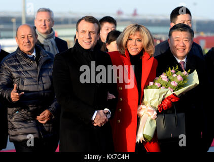 Xi'an, China's Shaanxi Province. 8th Jan, 2018. French President Emmanuel Macron and his wife Brigitte Macron arrive in Xi'an, capital of northwest China's Shaanxi Province, Jan. 8, 2018. Xi'an is the first stop of Macron's 3-day state visit to China, as invited by Chinese President Xi Jinping. Credit: Liu Xiao/Xinhua/Alamy Live News
