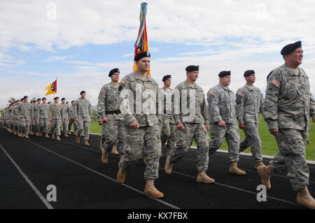 (US Army National Guard photo by Sgt. Nicolas A. Cloward)   Governor's Day 2013 was held at Westlake High School this year.  Members of the Utah Army and Air National guard filled the stadium for the annual event. This event gives the governor the chance to inspect his troops annually and address them as their commander-in-chief. This also gives the community the opportunity to interact with their citizen soldiers. This year marks the first year Maj. Gen. Jefferson Burton is officiating as The adjutant general. Stock Photo