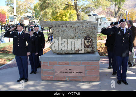 Photos by:  Capt. Ryan Sutherland  Fort Douglas, Utah - Brig. Gen. Dallen Atack and members of the Utah National Guard's 23rd Army Band participated in the Utah Fallen Warrior Memorial held Oct. 21, 2013, at the Fort Douglas Military Museum. Stock Photo