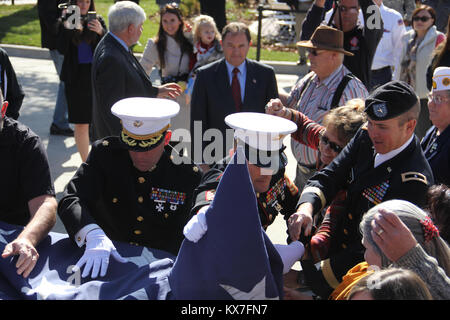 Photos by:  Capt. Ryan Sutherland  Fort Douglas, Utah - Brig. Gen. Dallen Atack and members of the Utah National Guard's 23rd Army Band participated in the Utah Fallen Warrior Memorial held Oct. 21, 2013, at the Fort Douglas Military Museum. Stock Photo