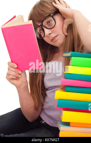 close up, concentrated reading girl, isolated on background Stock Photo