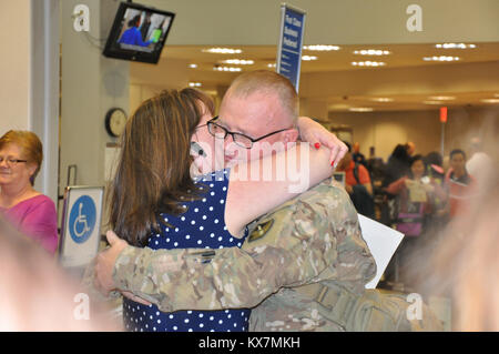 Eighteen members of the 65th Field Artillery Brigade returned from a 12-month deployment to Afghanistan where they served as Security Forces Advise and Assist Team members. Stock Photo