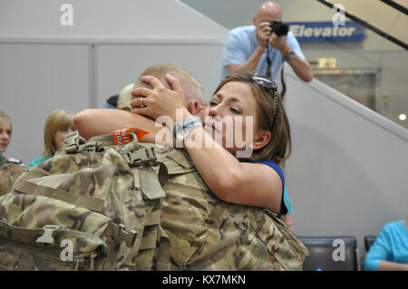 Eighteen members of the 65th Field Artillery Brigade returned from a 12-month deployment to Afghanistan where they served as Security Forces Advise and Assist Team members. Stock Photo