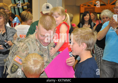 Eighteen members of the 65th Field Artillery Brigade returned from a 12-month deployment to Afghanistan where they served as Security Forces Advise and Assist Team members. Stock Photo