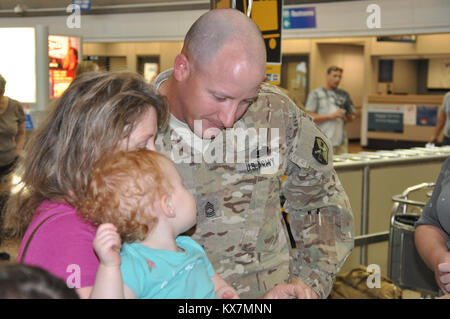 Eighteen members of the 65th Field Artillery Brigade returned from a 12-month deployment to Afghanistan where they served as Security Forces Advise and Assist Team members. Stock Photo