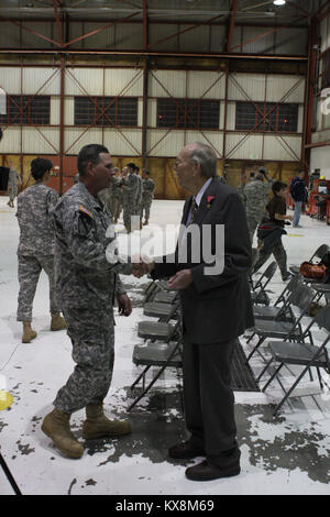 Richard Johnson, a World War II veteran who served in the European Theater of Operations as an infantry machine gunner, officially recieved the Bronze Star Medal he earned during WWII in a ceremony at the E. J. Garn Aviation Complex in West Jordan Nov. 19, 2010. Stock Photo