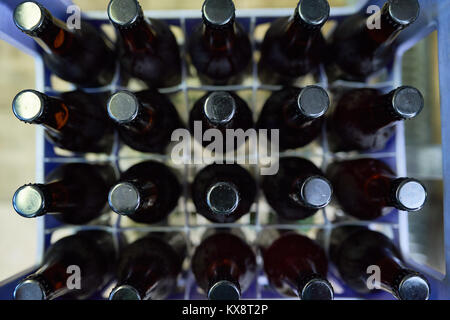 Beer Bottles in Plastic Crate Stock Photo