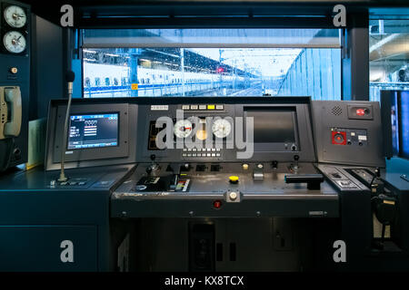 NAGOYA, JAPAN - NOVEMBER 18, 2015: Interior of control cabin with dashboards on a Japanese train Stock Photo