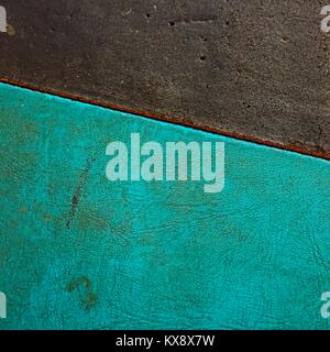 Weathered blue and turquoise leather/ vinyl background. Stock Photo