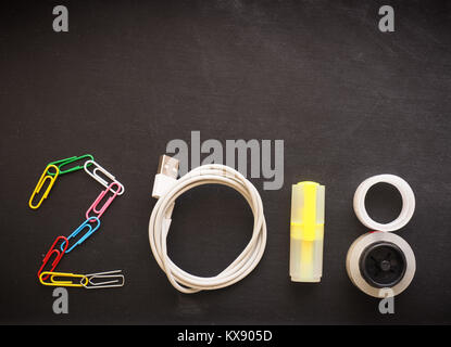 2018 with office utensils on a blackboard with space for text or image Stock Photo