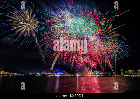 Firework display for Singapore National day which celebrated every year on August 9, in commemoration of the Singapore's independence in 1965. Stock Photo