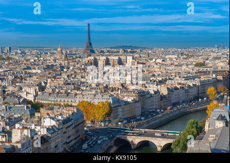 Paris cityscape aerial, view to the west of Paris above the rooftops of the Left Bank towards the Eiffel Tower on the city skyline, France. Stock Photo